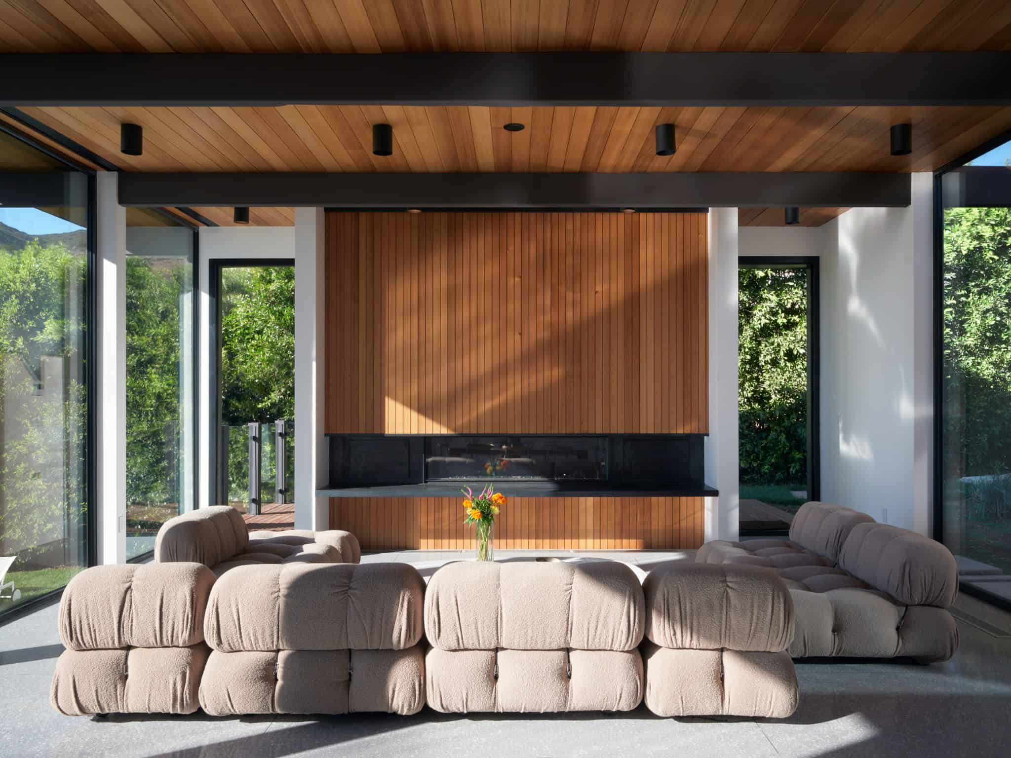 Malibu Glass Box House by Klopf Architecture – living room at fireplace wall, Malibu, California