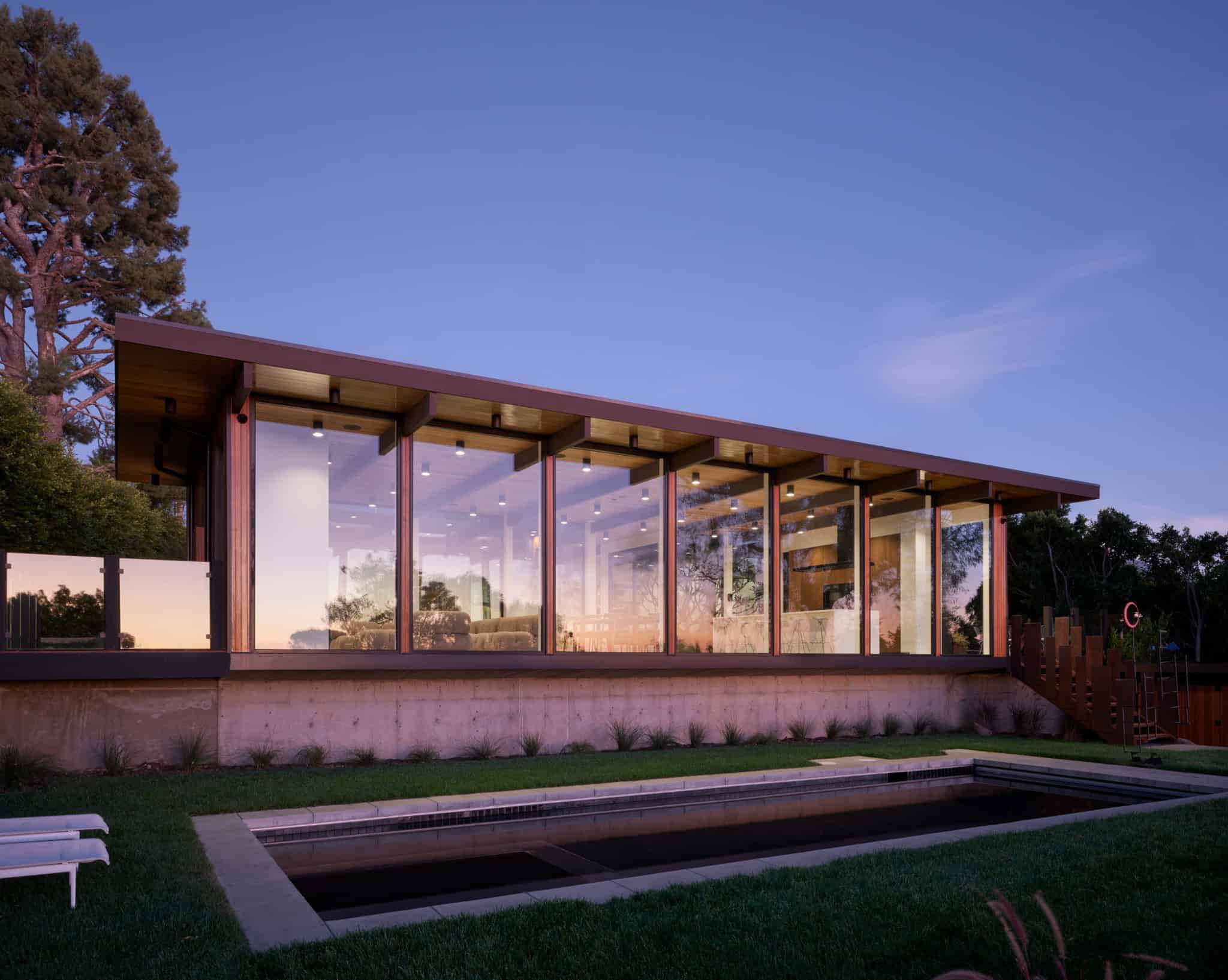 Malibu Glass Box House by Klopf Architecture – pool facade dusk, Malibu, California