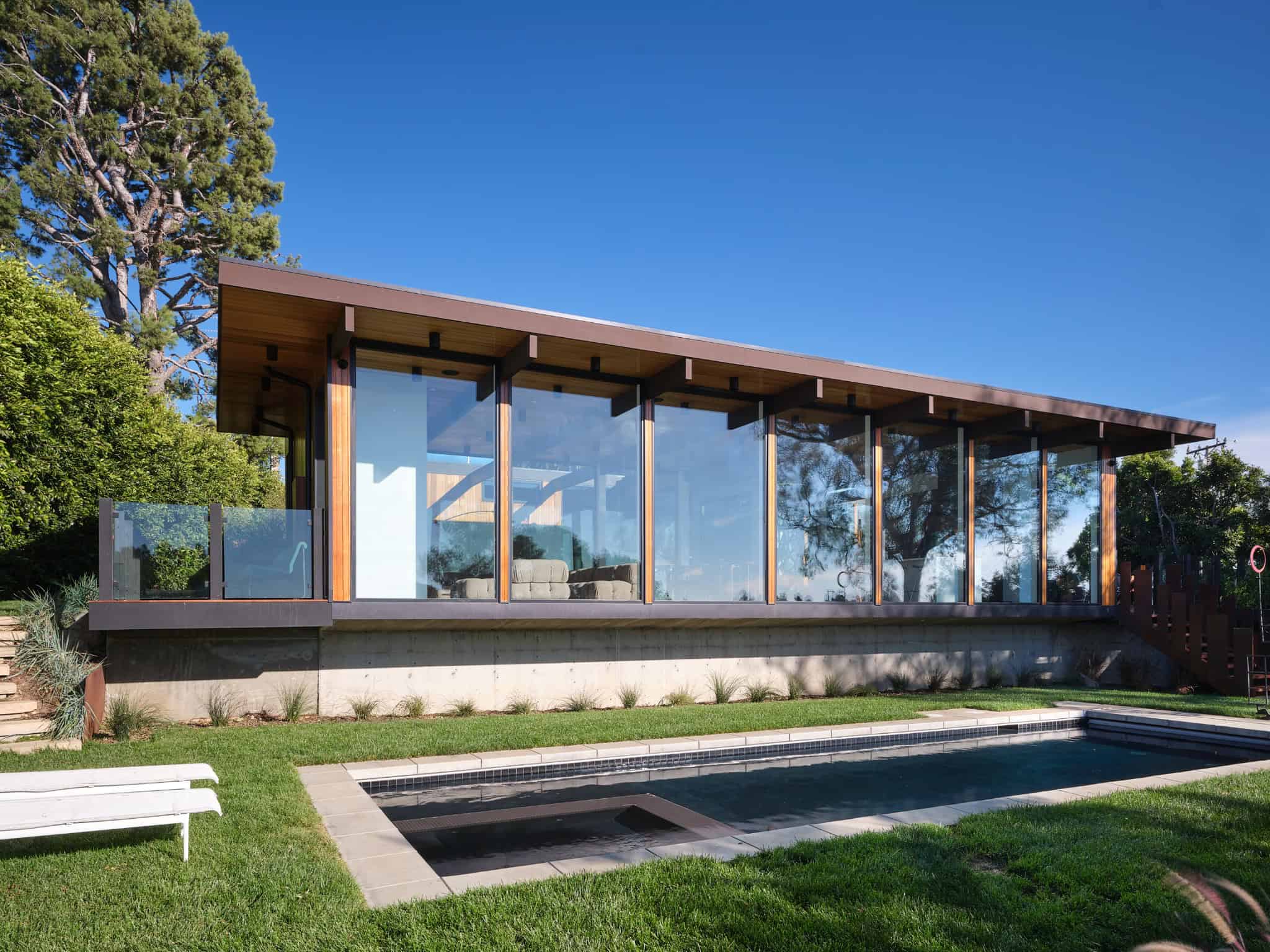Malibu Glass Box House by Klopf Architecture – wide pool facade, Malibu, California
