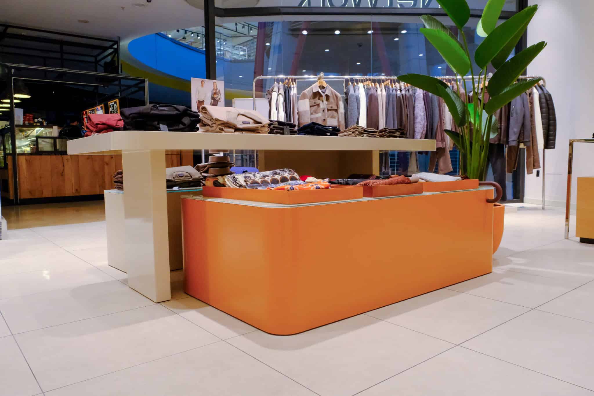 NetWork Stores Display Island by Boytorun Architects NetWork Stores orange display island by Boytorun Architects in Turkey
