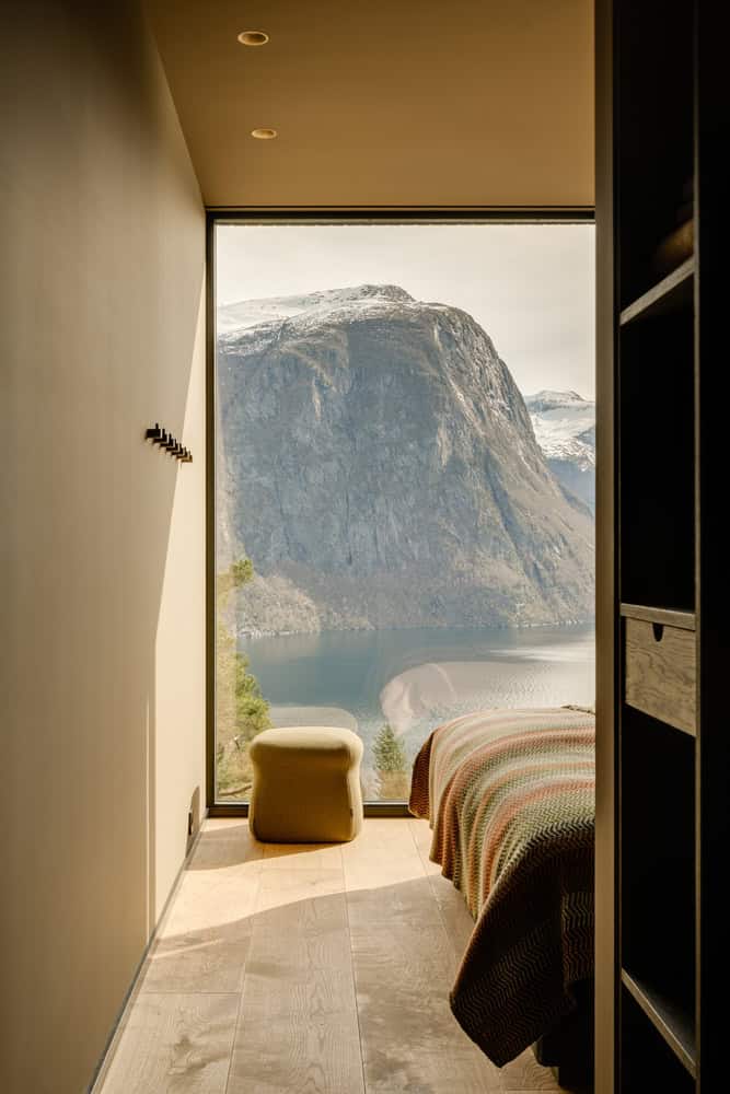 18-07 Holiday Home Bedroom Fjord View by OFFICE INAINN 18-07 Holiday Home by OFFICE INAINN, bedroom with panoramic fjord view framed by floor-to-ceiling window