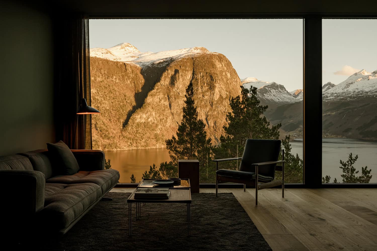 18-07 Holiday Home Living Room Fjord View by OFFICE INAINN 18-07 Holiday Home by OFFICE INAINN, living room with panoramic fjord view in Norway