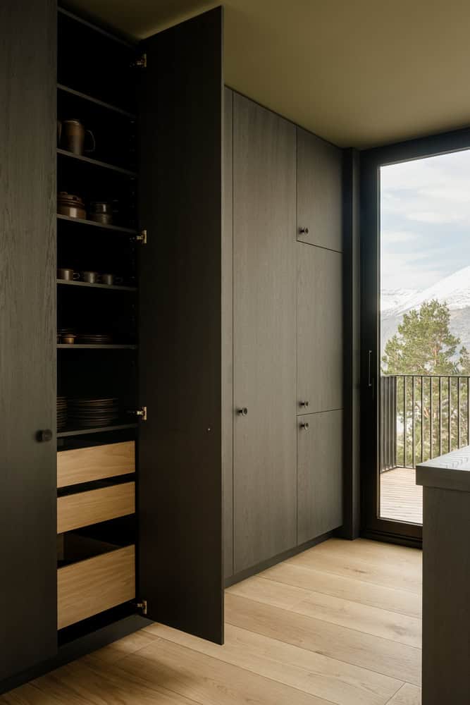 18-07 Holiday Home Wooden Cabinetry Detail by OFFICE INAINN 18-07 Holiday Home by OFFICE INAINN, dark wood cabinetry detail in coastal Norway kitchen