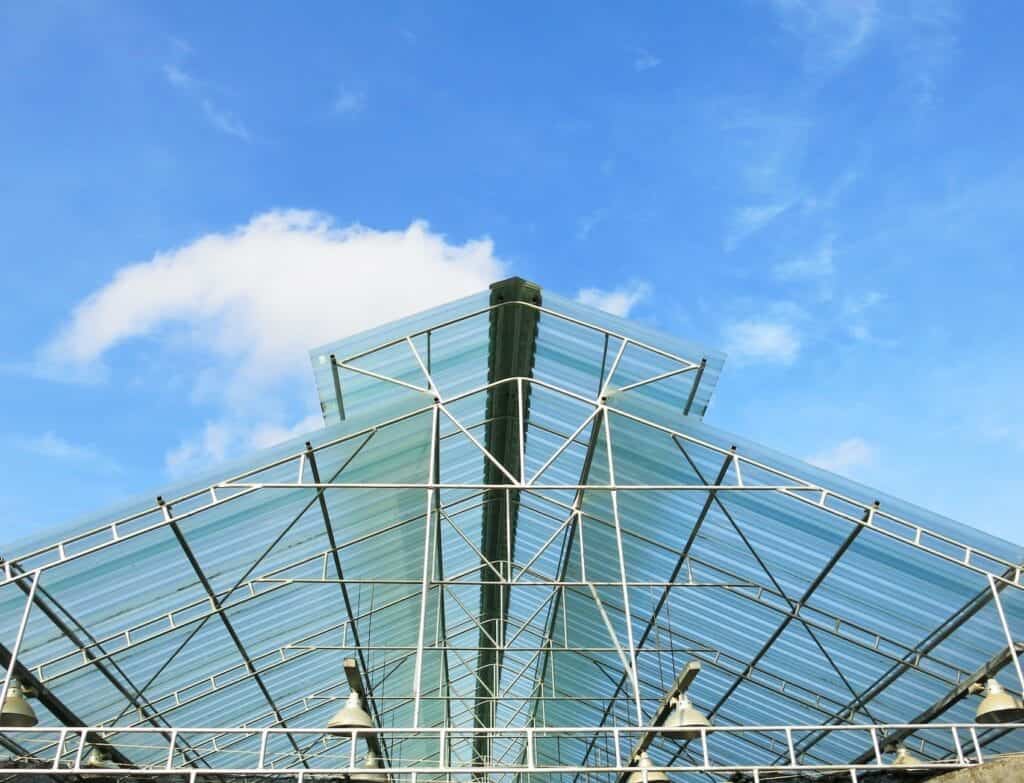 Contemporary pergola with fiberglass polymer roof panels—lightweight translucent roofing for modern outdoor design