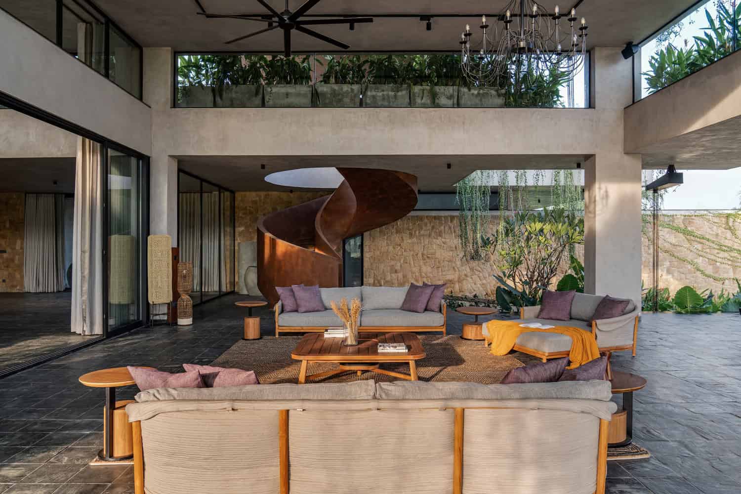 Antriya House Double-Height Lounge & Spiral Stair by 23 Degrees Design Shift Antriya House by 23 Degrees Design Shift — double-height lounge with sculptural spiral stair, Hyderabad, India