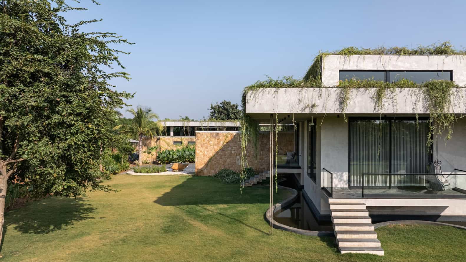 Antriya House Terrace Bedroom View by 23 Degrees Design Shift Antriya House by 23 Degrees Design Shift — bedroom terrace opening to gardens, Hyderabad, India