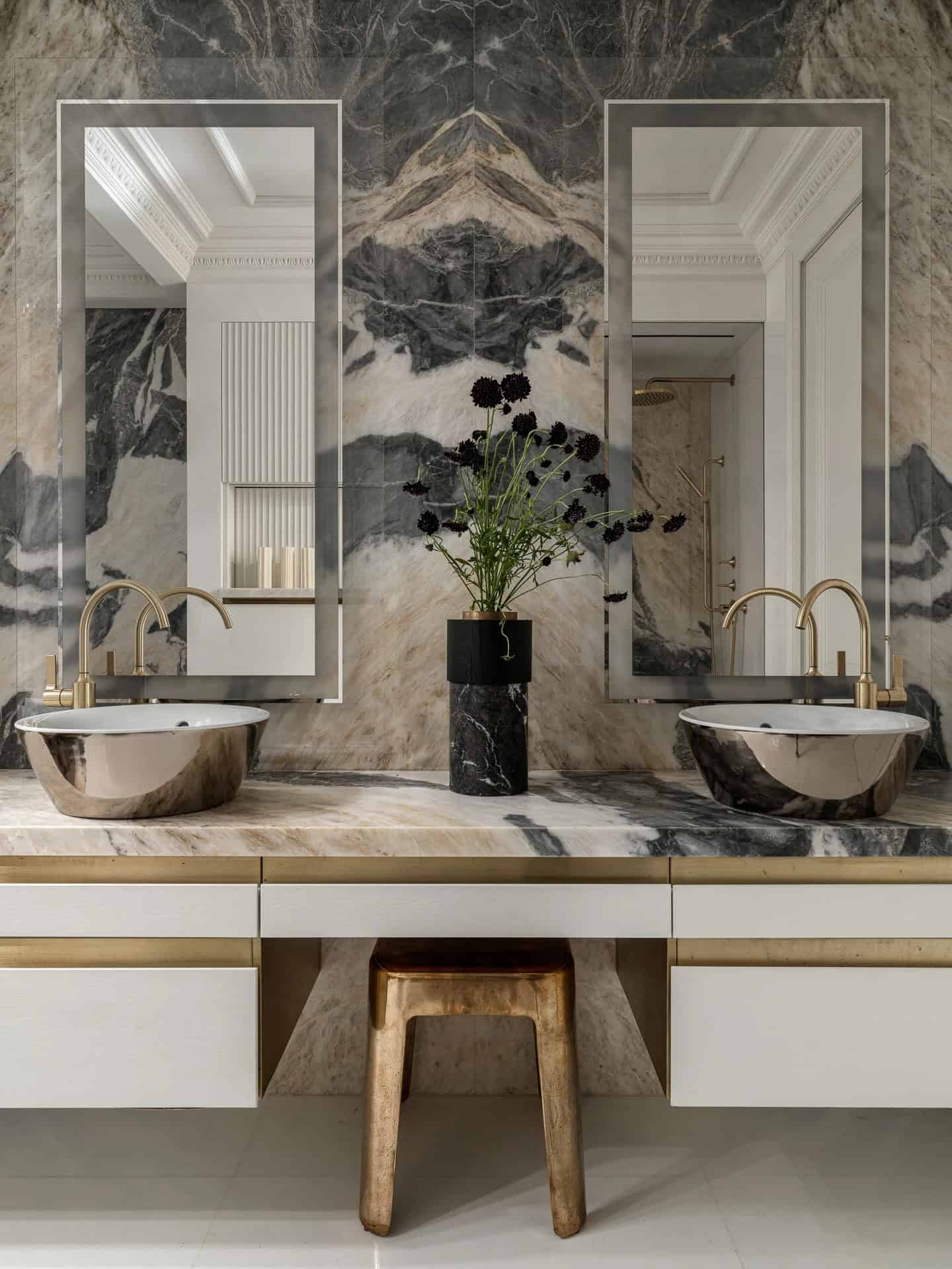 Apartment with a Parisian Mood for Collectors Bathroom Double Vanity by AABA Architects Double vanity with marble wall and brass fixtures — AABA Architects, Moscow