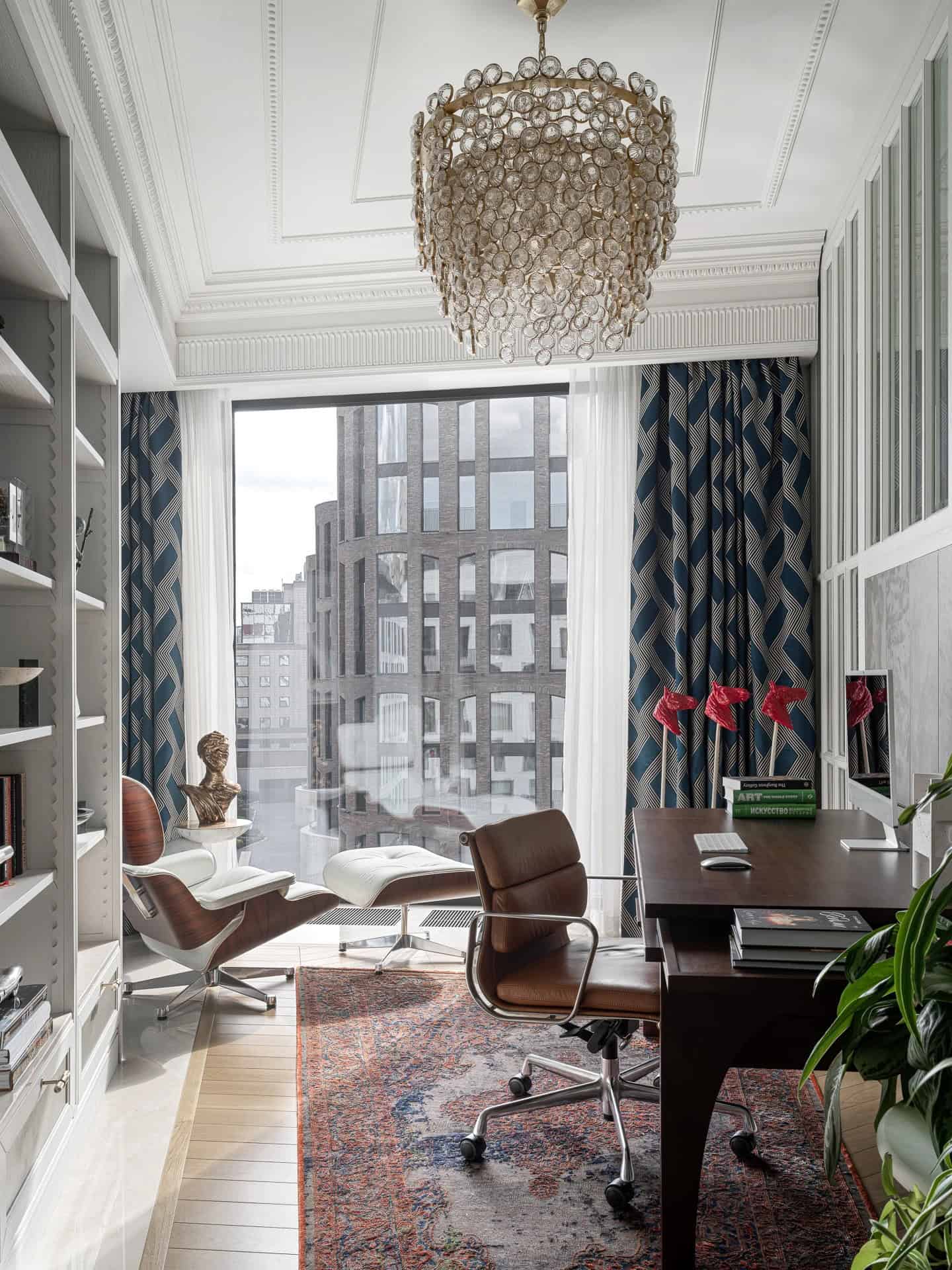 Apartment with a Parisian Mood for Collectors Home Office Chandelier by AABA Architects Home office with chandelier, Eames lounge and patterned drapery — AABA Architects, Moscow