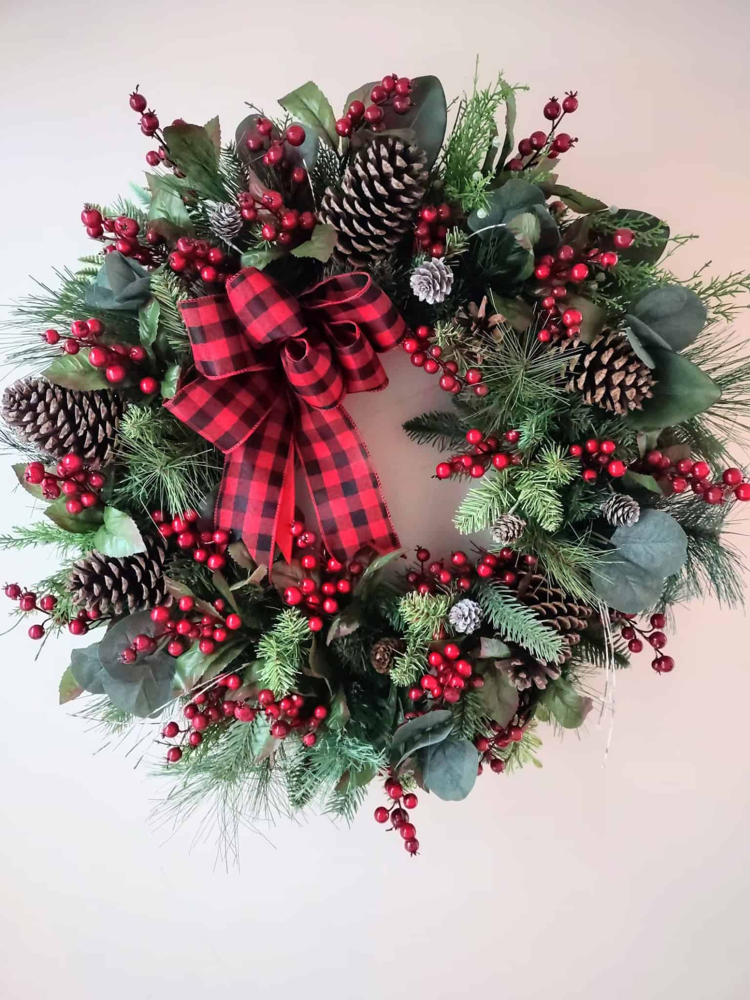 Buffalo Plaid Bow Pinecone and Berry Wreath — classic berry Christmas wreath
