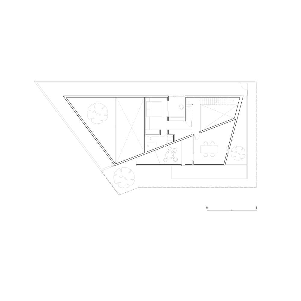 Modern architectural house floor plan with geometric design and outdoor landscaping, showcasing innovative architecture art designs.