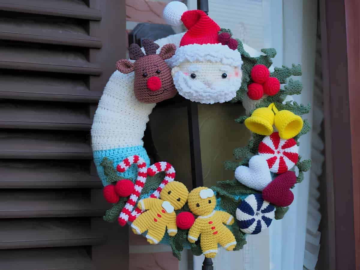 Handmade crochet Christmas wreath with Santa, reindeer, and candy canes