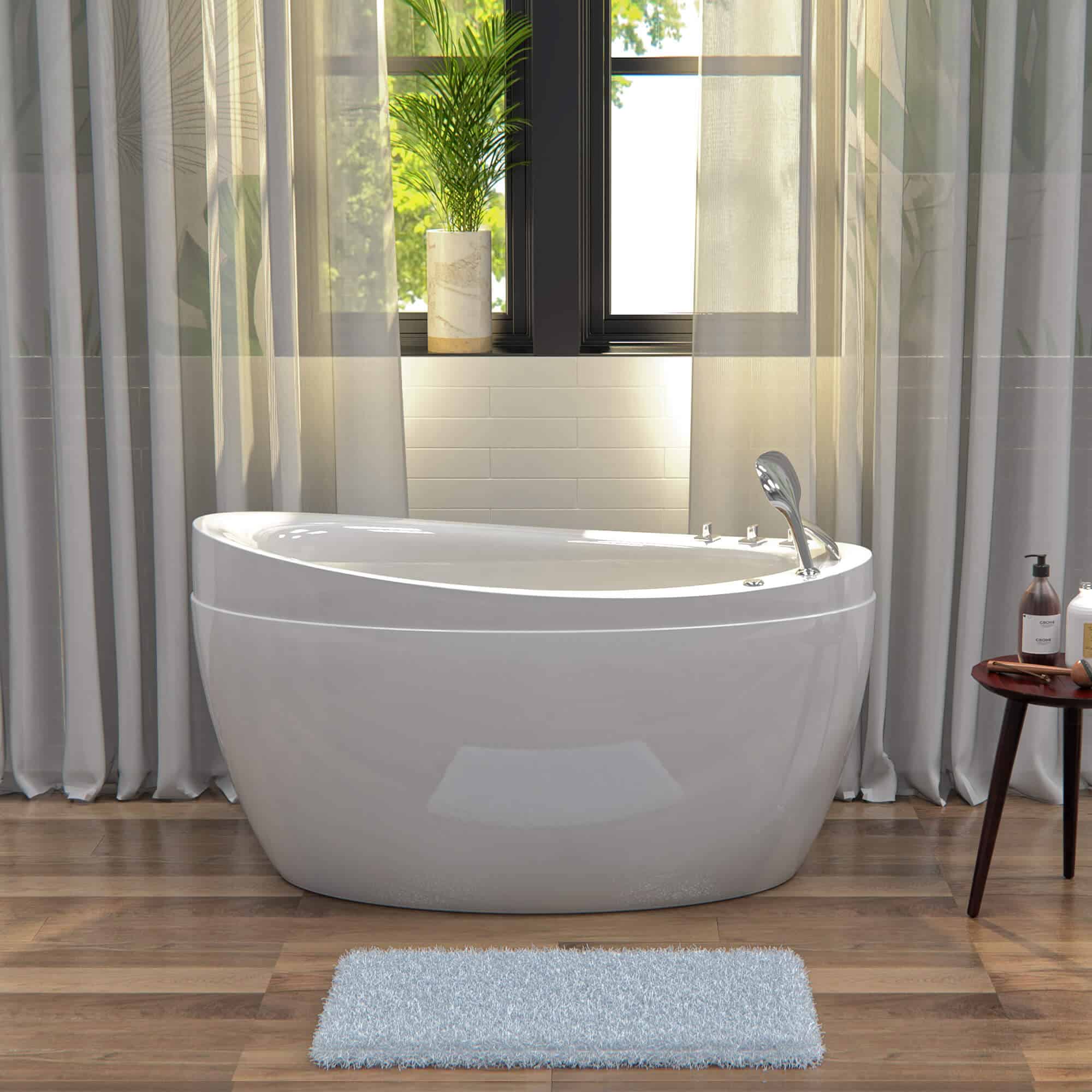 Compact soaking tub with deep water level in small modern bathroom