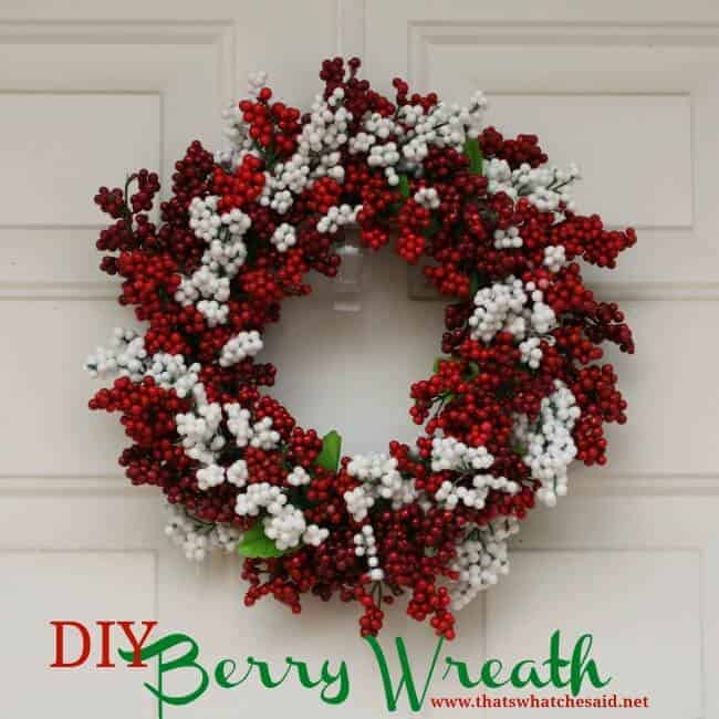 DIY red and white berry Christmas wreath on white door