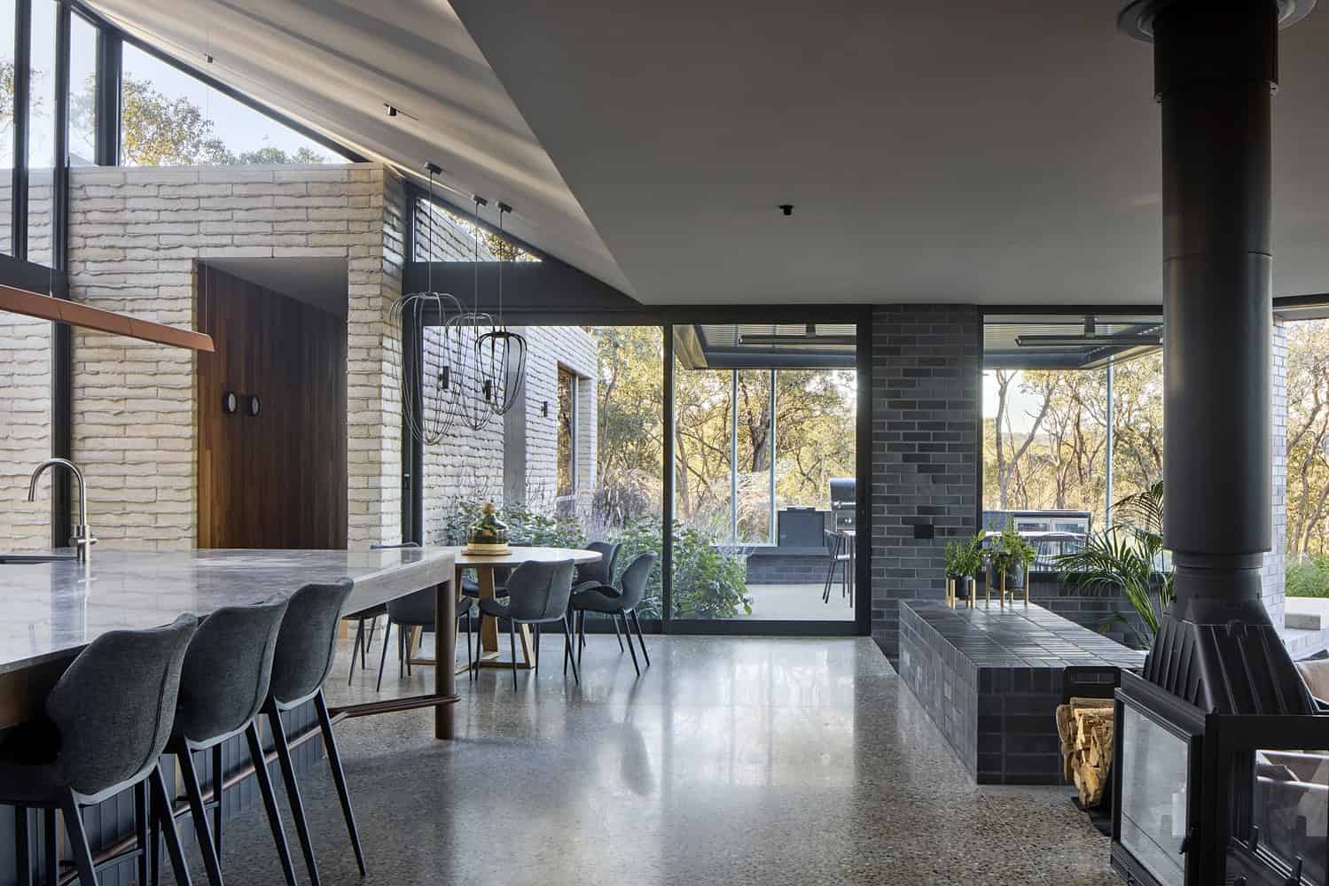 Korinda House Dining Living Hearth by Bent Architecture Korinda House by Bent Architecture — dining area and living hearth, Plenty, Victoria