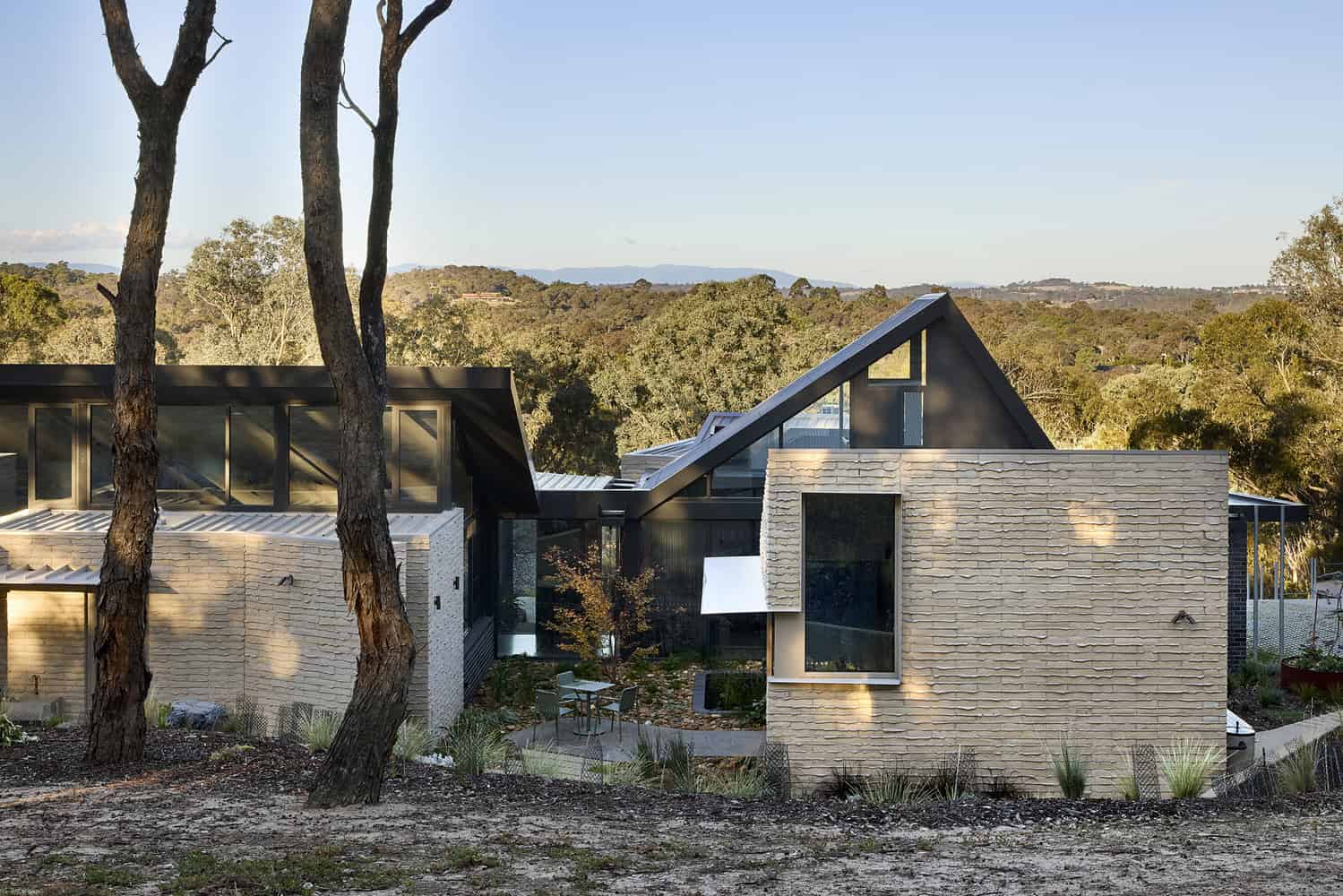 Korinda House Exterior Overview Gabled Roofs by Bent Architecture Korinda House by Bent Architecture — exterior overview with gabled roofs, Plenty, Victoria