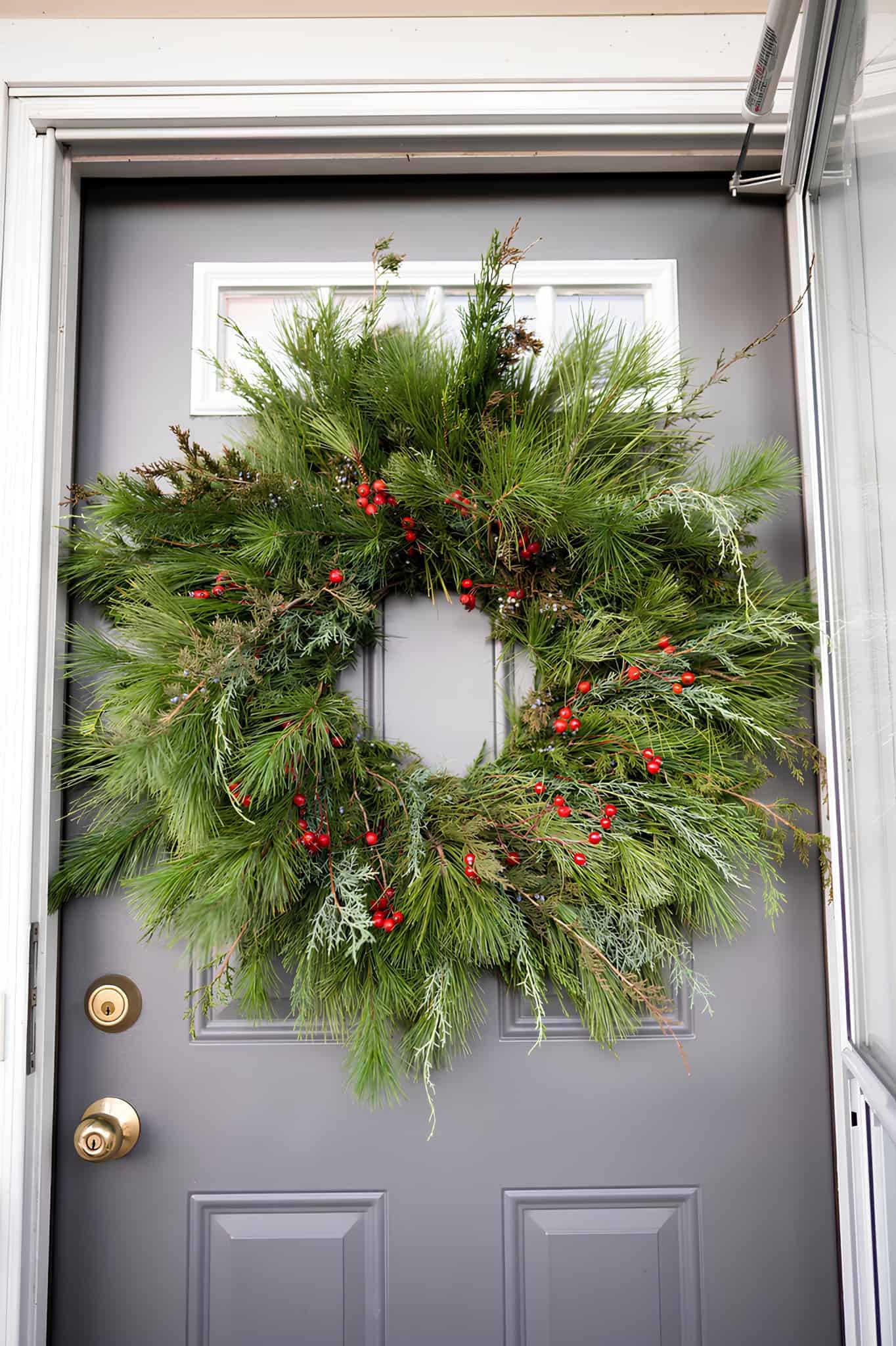 Large natural long-needle pine wreath with red berries