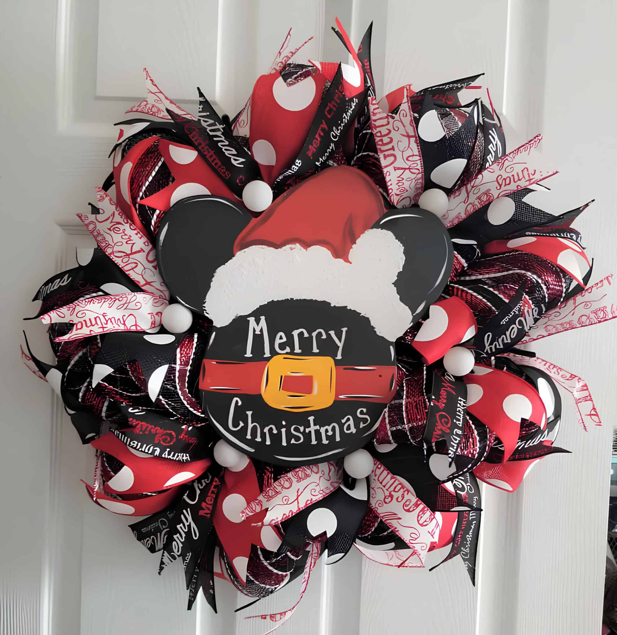 Red, black and white ribbon wreath with Mickey silhouette and Santa hat