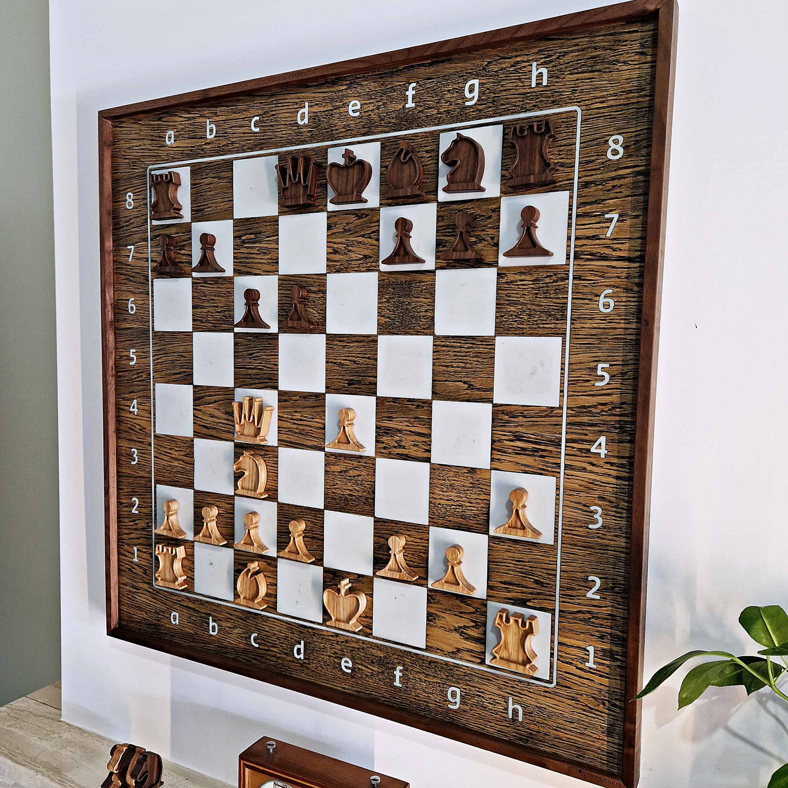 Vertical wall-mounted magnetic chess board in solid walnut with epoxy inlays