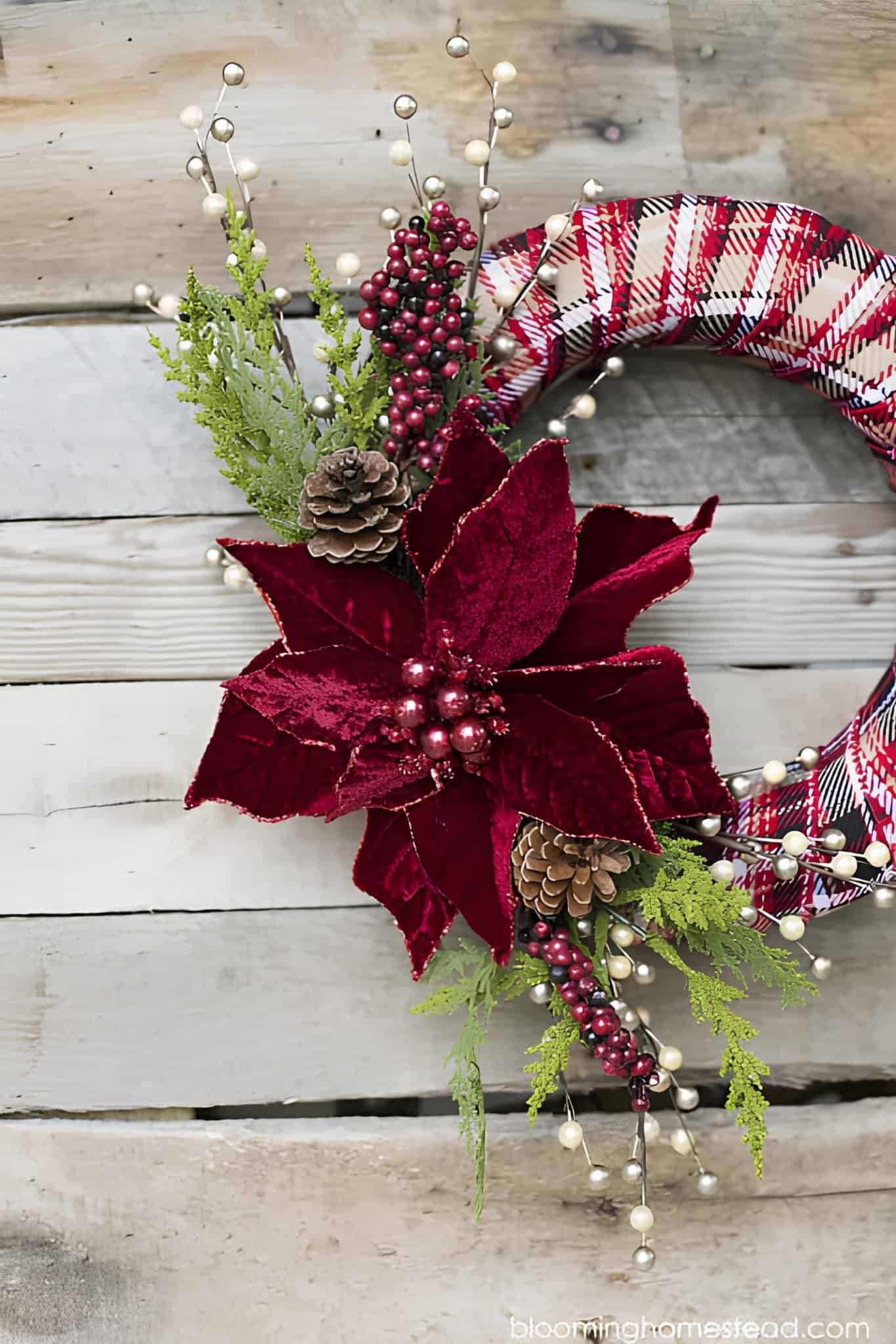 Soft pastel Christmas wreath made with feathers in pink, blue, and white tones