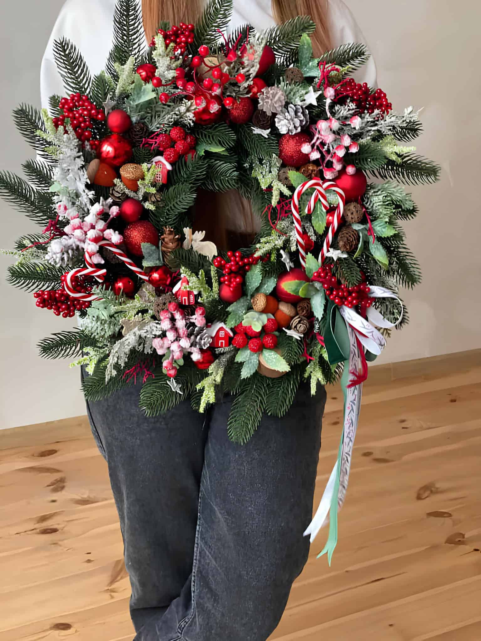 Cozy evergreen pine wreath with bright red berries