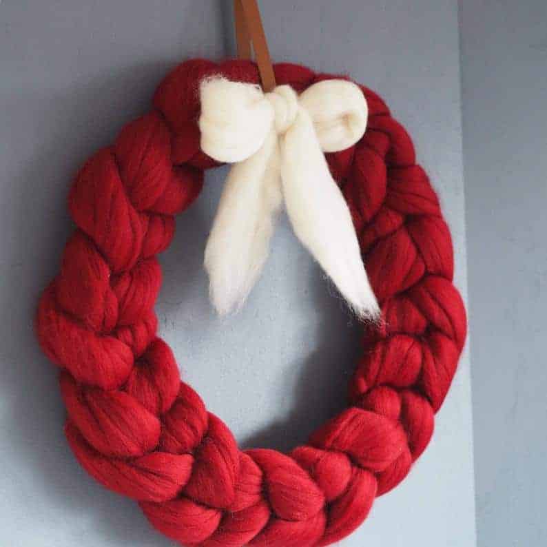 Chunky knit red Christmas wreath with white bow
