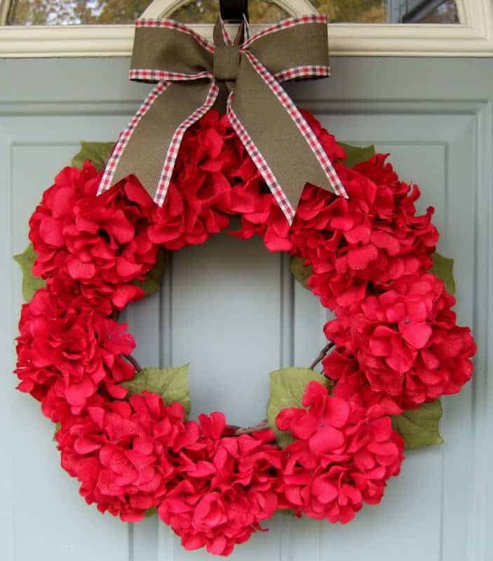 Red hydrangea wreath with green plaid bow