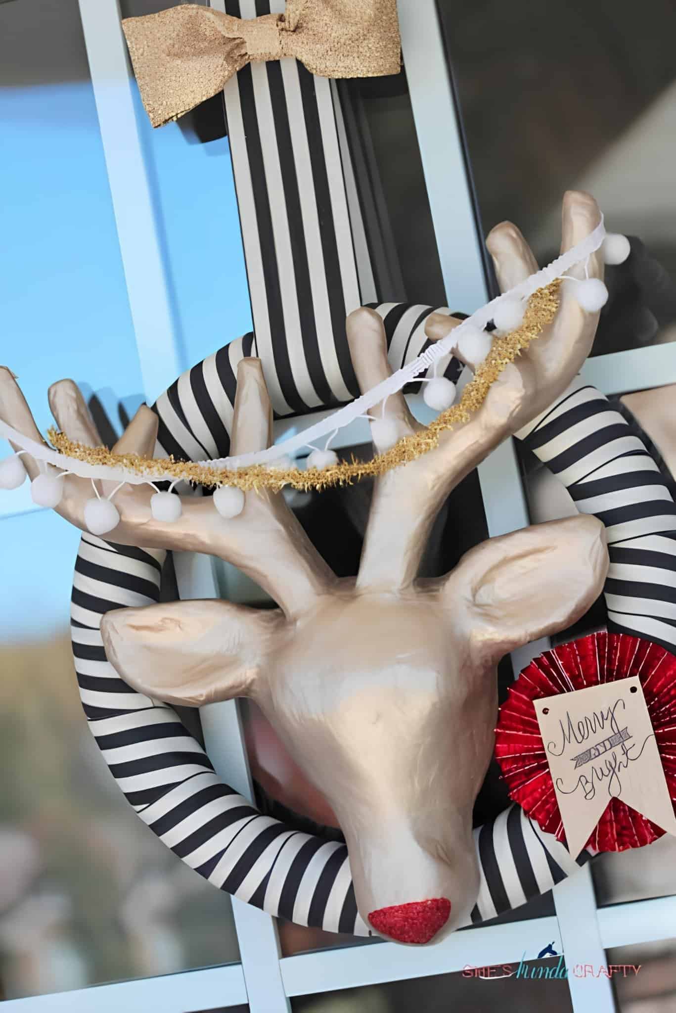 Rustic silver-toned Christmas wreath with pinecones and ornaments