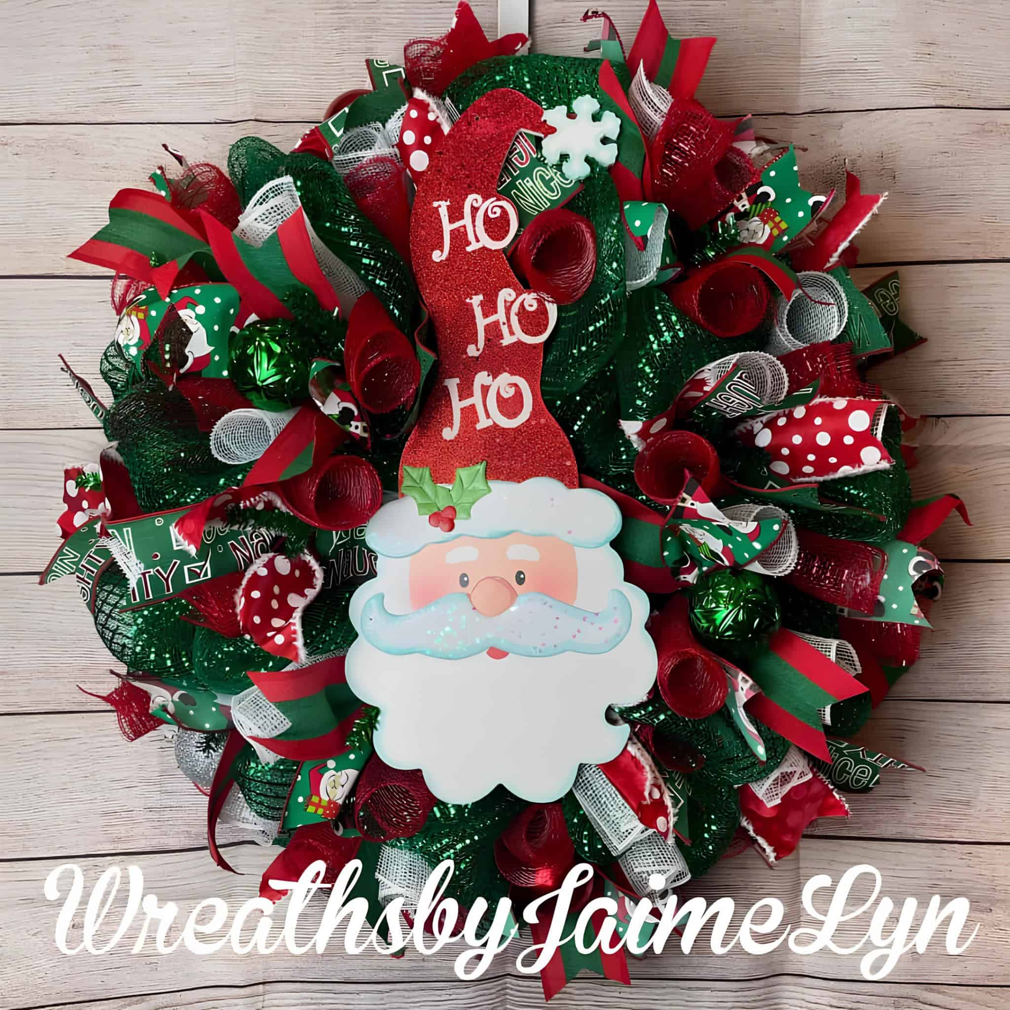 Santa deco mesh wreath in red and green with Ho Ho Ho sign