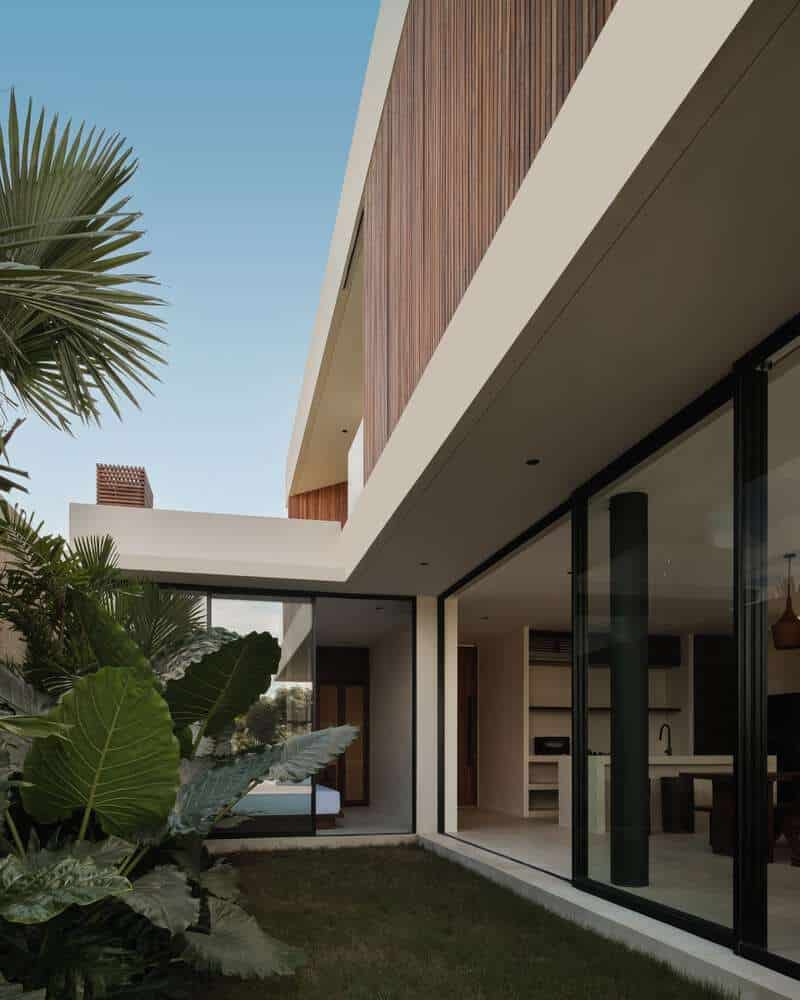 Tapa Villa Courtyard View by Studio Tanama Tapa Villa by Studio Tanama courtyard view with lush tropical garden in Bali, Indonesia