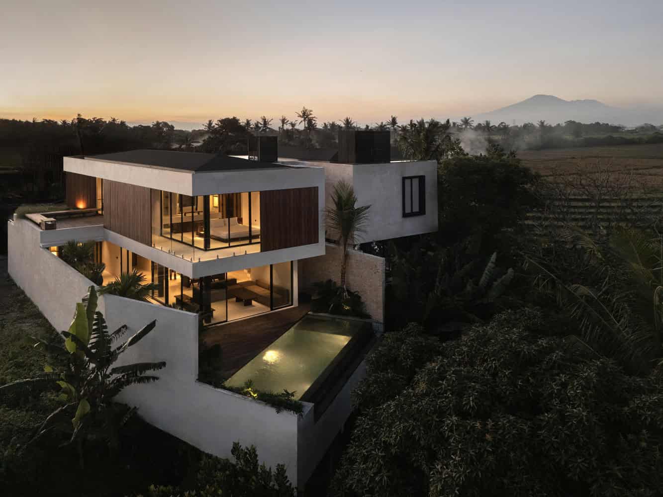 Tapa Villa Exterior Aerial by Studio Tanama Tapa Villa by Studio Tanama aerial exterior view at dusk in Bali, Indonesia