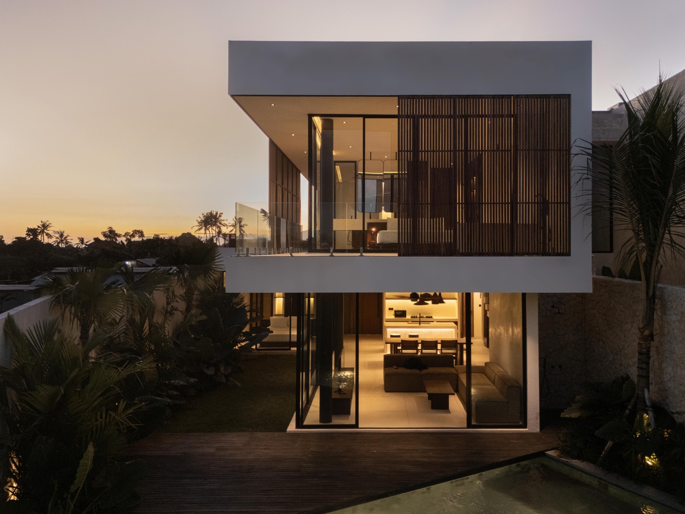 Tapa Villa Exterior Dusk Front by Studio Tanama Tapa Villa by Studio Tanama exterior front view illuminated at dusk in Bali, Indonesia