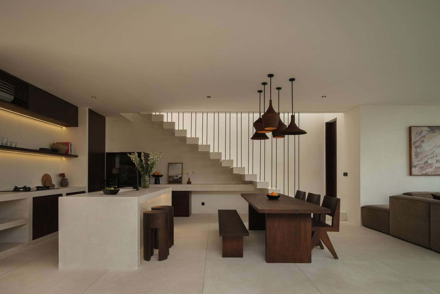Tapa Villa Kitchen Dining & Stair by Studio Tanama Tapa Villa by Studio Tanama kitchen and dining space with floating stair in Bali, Indonesia