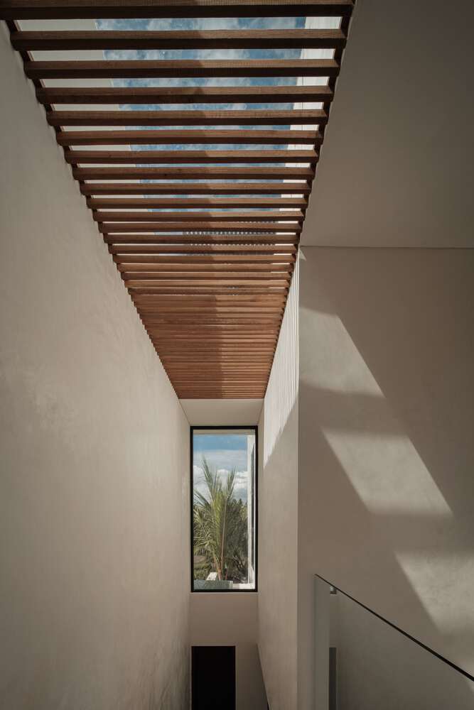 Tapa Villa Stair Skylight by Studio Tanama Tapa Villa by Studio Tanama staircase with skylight and wooden slats in Bali, Indonesia