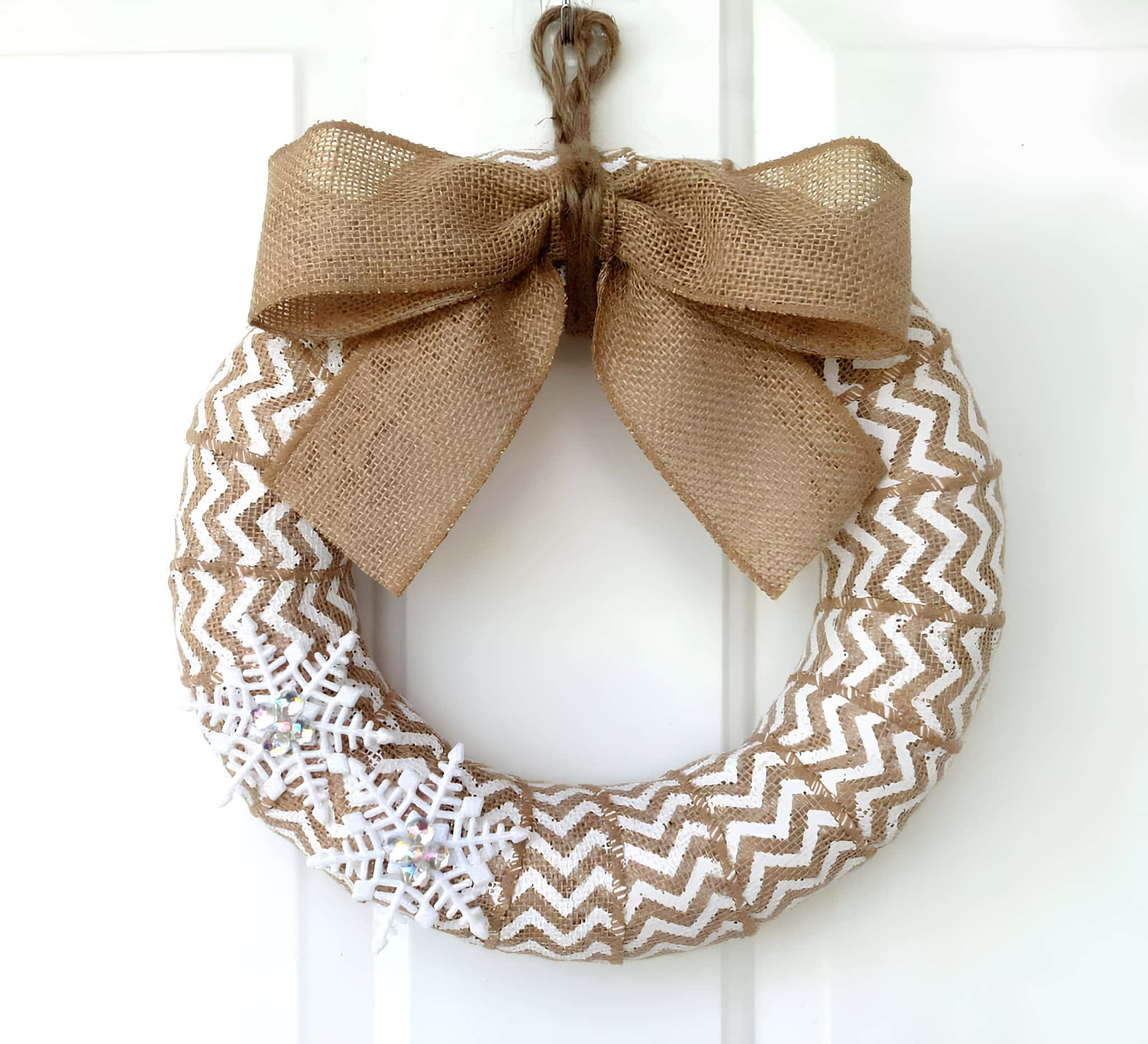 White chevron burlap wreath with snowflakes and burlap bow