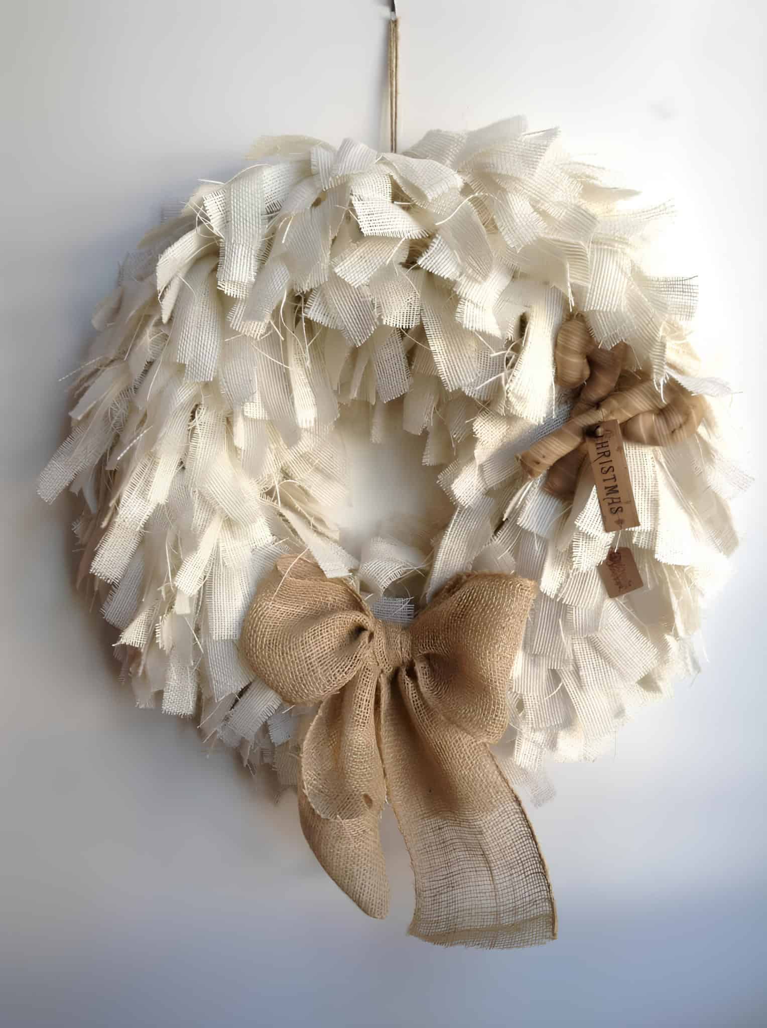 White rag wreath with burlap bow and rustic charm