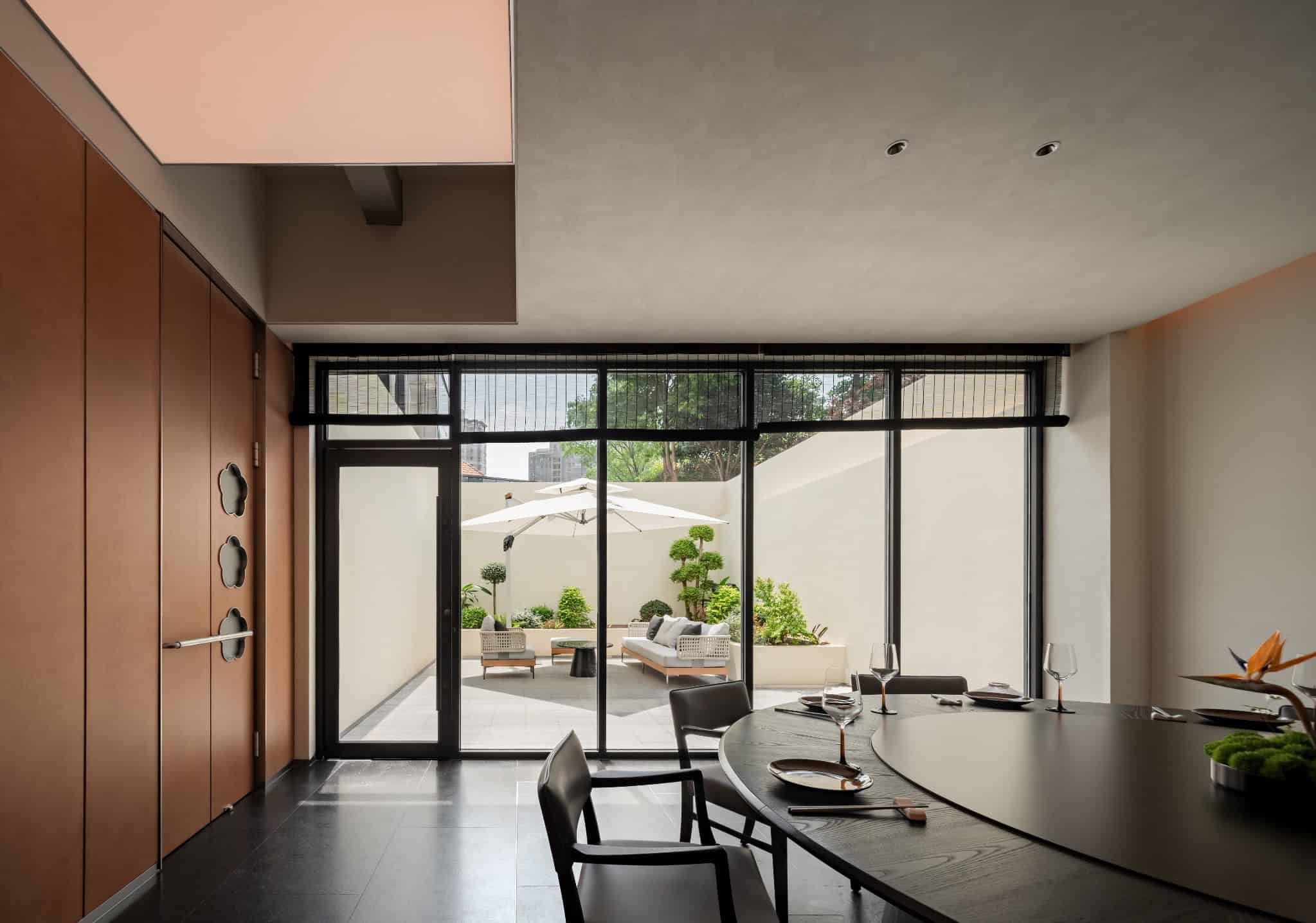 Yang’s Qing Lobster · Bai Jia Hu Store Private Dining with Terrace by IN.X Yang’s Qing Lobster · Bai Jia Hu Store by IN.X — private dining room opening to terrace, Nanjing, China