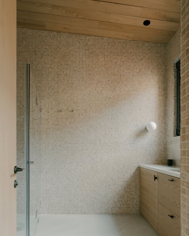 Birdsnest House Bathroom Mosaic Shower Wall by TIMM Architecture Birdsnest House by TIMM Architecture, bathroom with mosaic tile shower wall in Tbilisi, Georgia