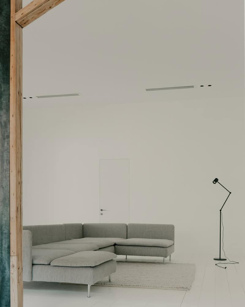 Birdsnest House Living Room Gray Sofa by TIMM Architecture Birdsnest House by TIMM Architecture, minimalist living room with gray sofa in Tbilisi, Georgia