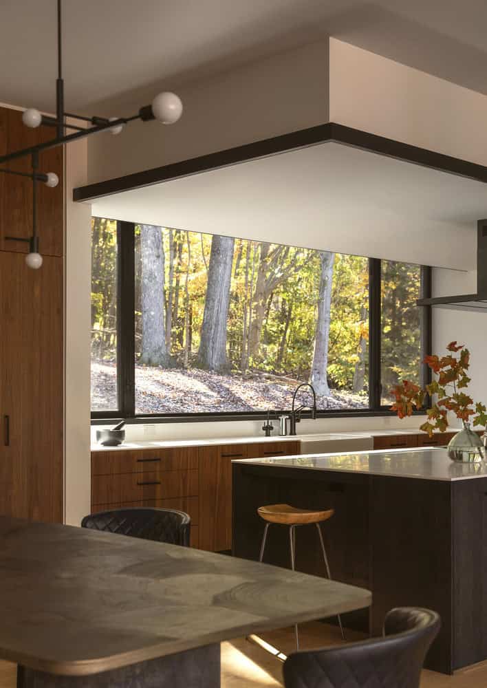 House in the Woods by Tom Lontine Architect, kitchen window detail with view to woodland beyond in Connecticut