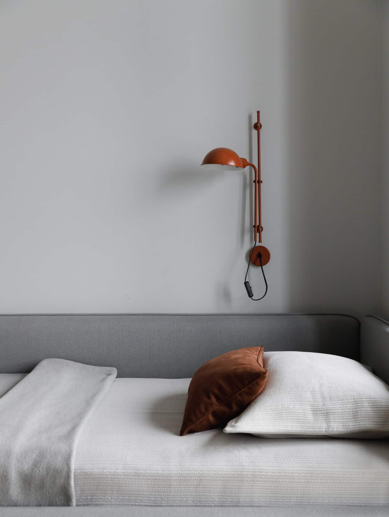 Kids bedroom bed with wall lamp in Lesoparkovy Apartment by STARIKOVA.ARCHITECTS Chelyabinsk Russia