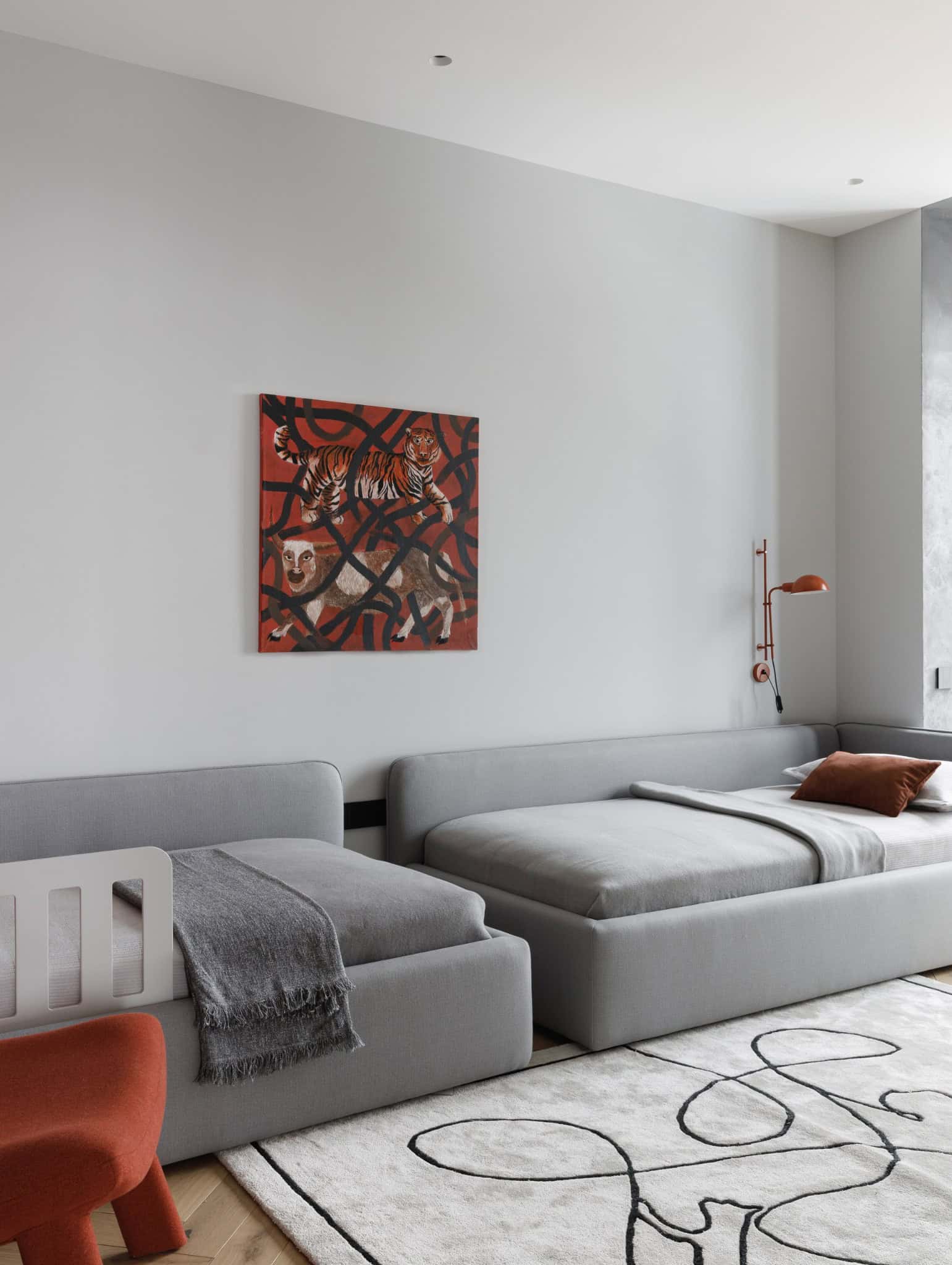 Lesoparkovy Apartment by STARIKOVA.ARCHITECTS kids bedroom with twin grey beds and artwork in Chelyabinsk, Russia