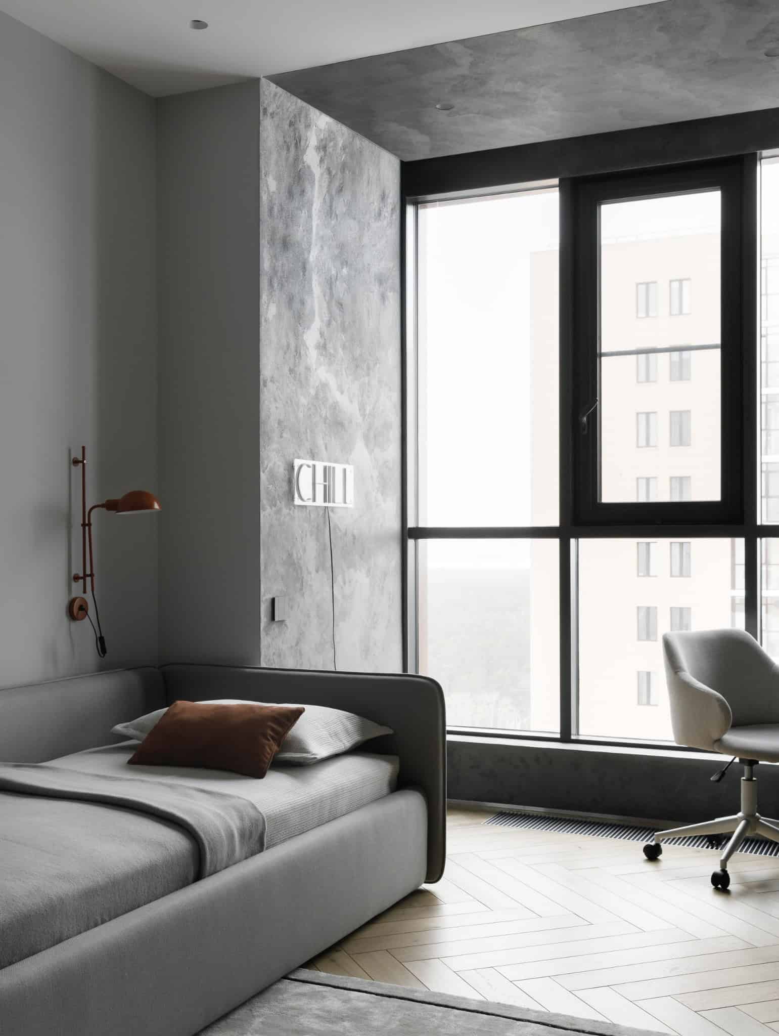 Kids room bed by large window in Lesoparkovy Apartment by STARIKOVA.ARCHITECTS