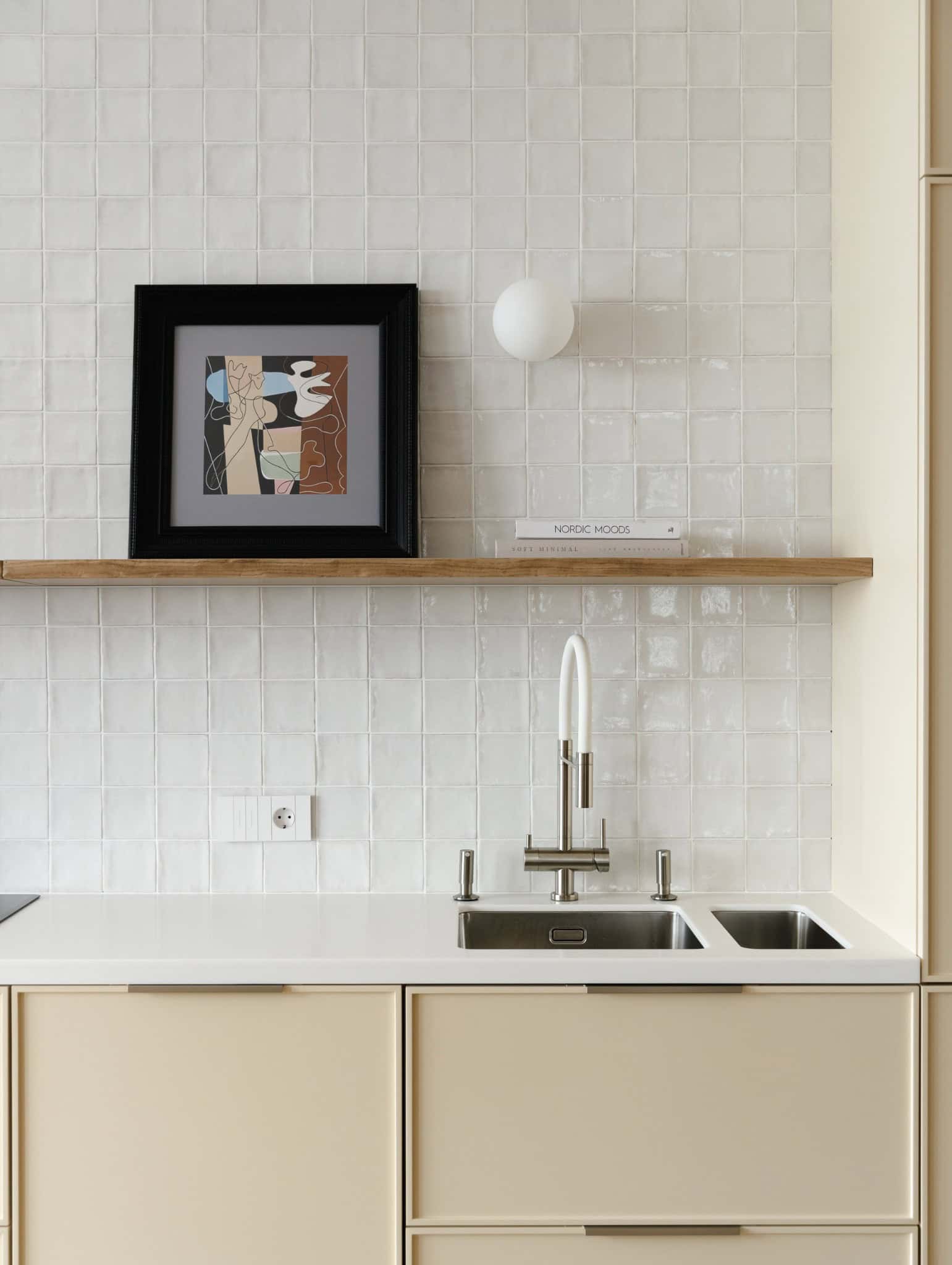 Lesoparkovy Apartment light kitchen with sink artwork and open shelf by STARIKOVA.ARCHITECTS in Chelyabinsk, Russia
