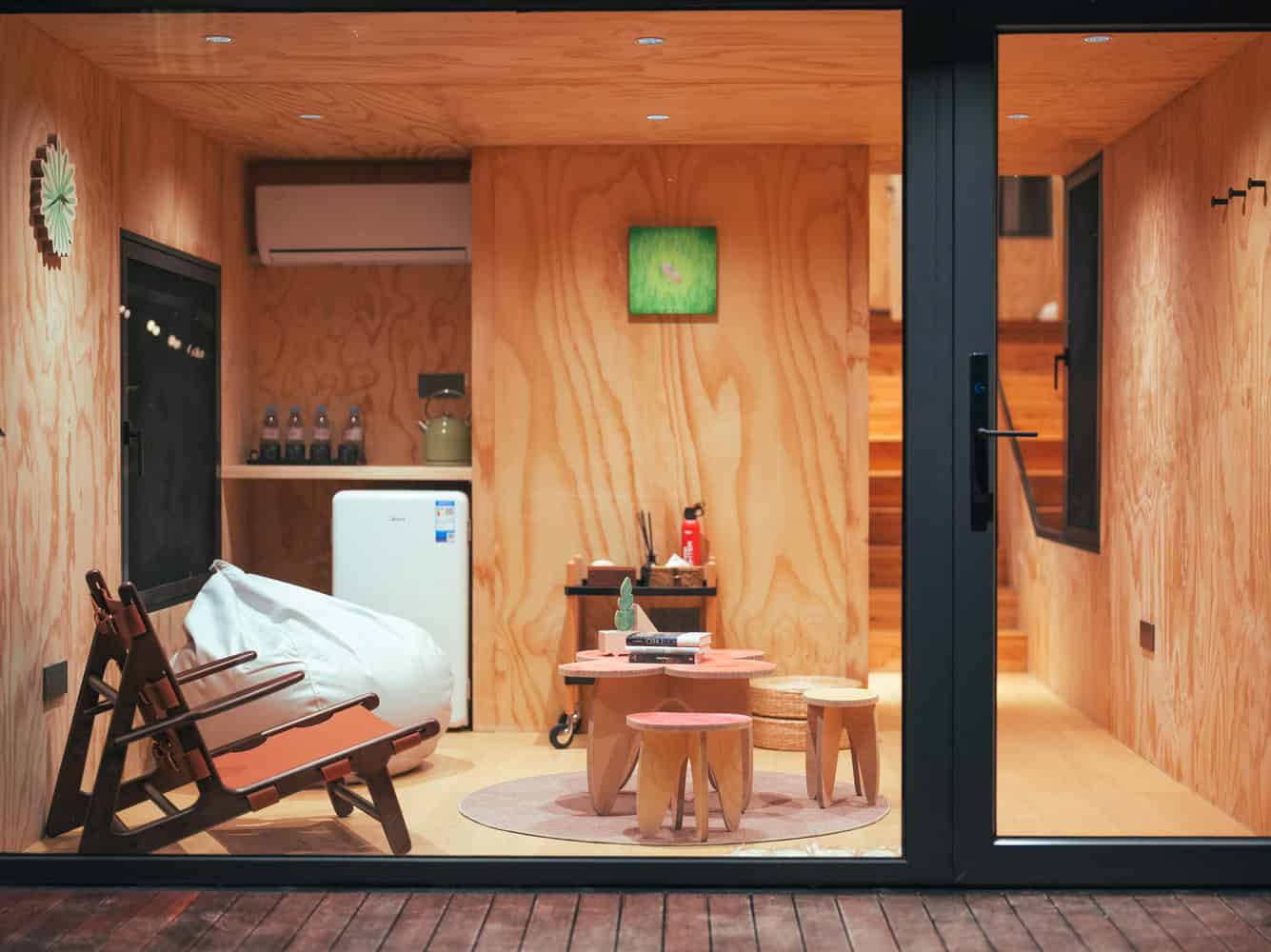 Merryda Wiki World-Secret Camp Interior Lounge Wooden by Wiki World + Advanced Architecture Lab Cozy plywood interior lounge at Merryda Wiki World-Secret Camp by Wiki World + Advanced Architecture Lab in China