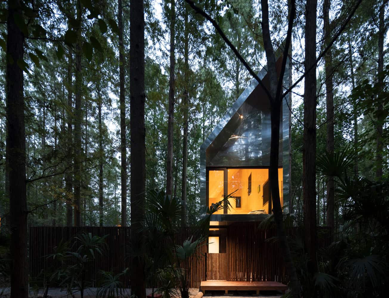 Merryda Wiki World-Secret Camp Gable Front Glazed Forest Cabin by Wiki World + Advanced Architecture Lab Glazed gable front of metal forest cabin at Merryda Wiki World-Secret Camp in China