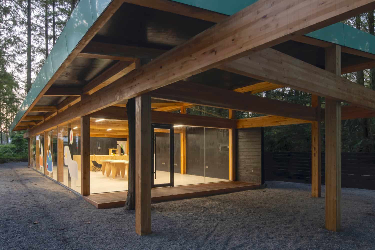 Merryda Wiki World-Secret Camp Timber Canopy Corner View Interior by Wiki World + Advanced Architecture Lab Corner view of timber canopy and glazed pavilion at Merryda Wiki World-Secret Camp in China