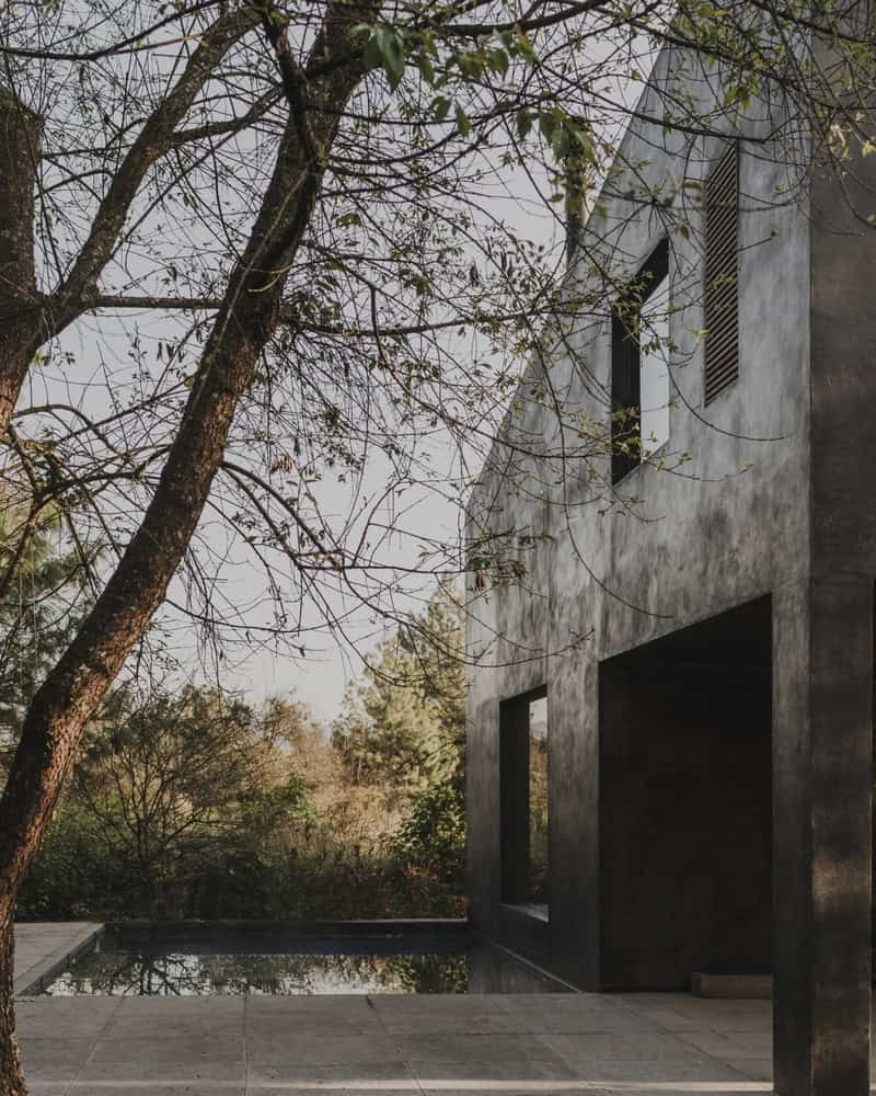 Ocote House by PPAA, corner elevation by pool edge, Mexico