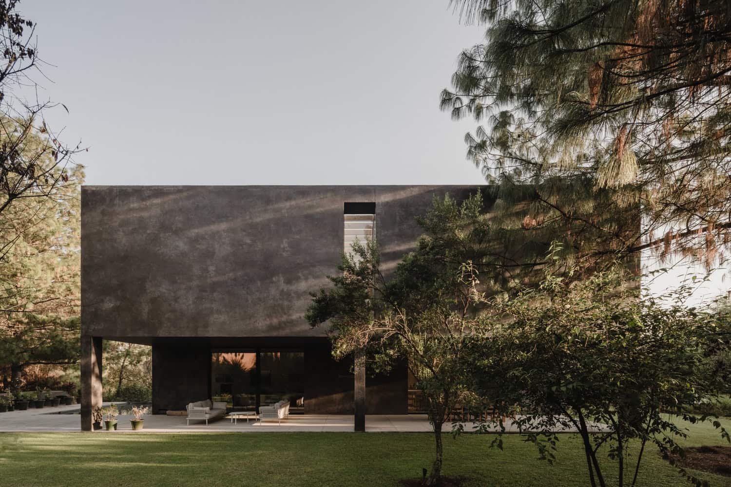 Ocote House by PPAA, garden elevation with slot window, Mexico