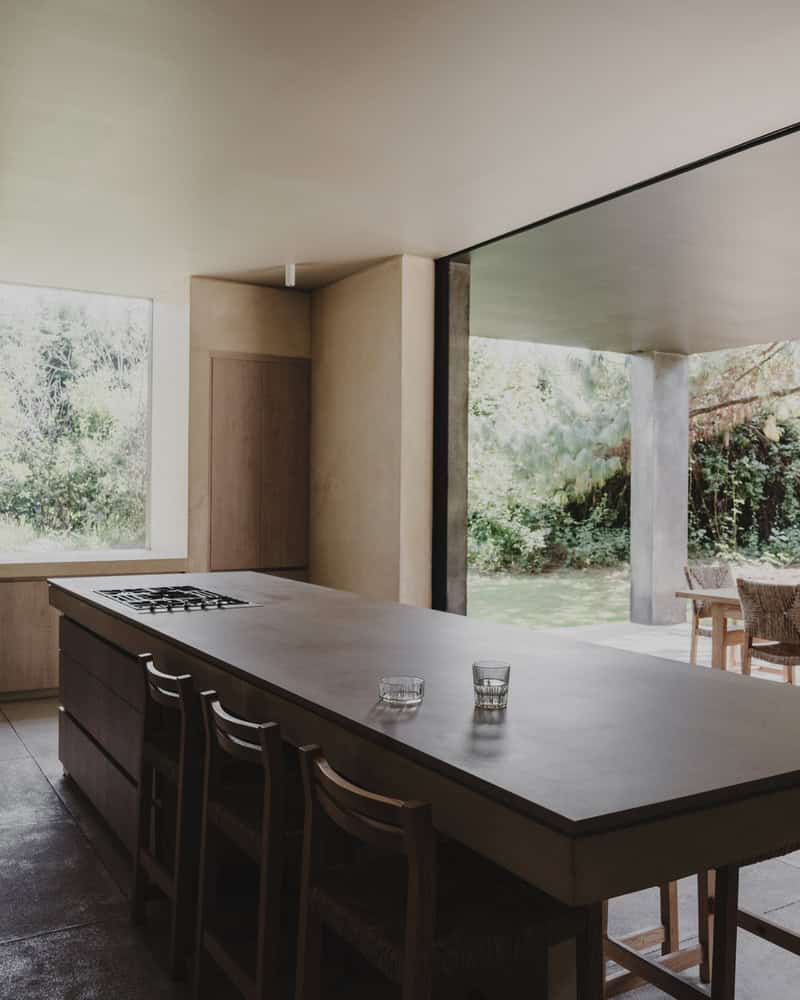 Ocote House by PPAA, kitchen island with window view, Mexico