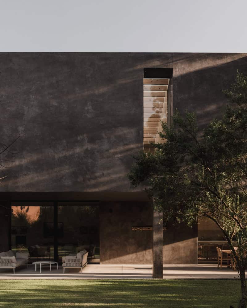 Ocote House by PPAA, lawn elevation with vertical slot window, Mexico